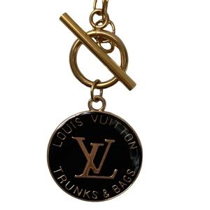 LOUIS VUITTON Black Goldtone Zipper Pull Bag Charm